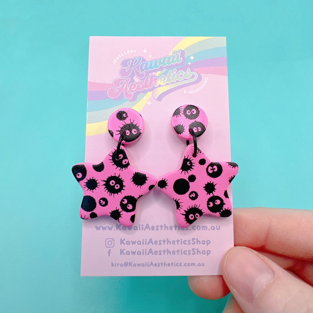 Pink and black soot sprite star stud earrings