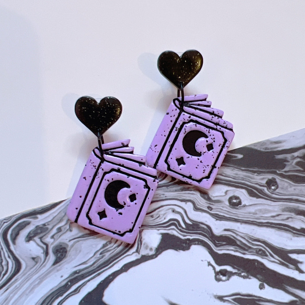 Purple and black spellbook stud earrings