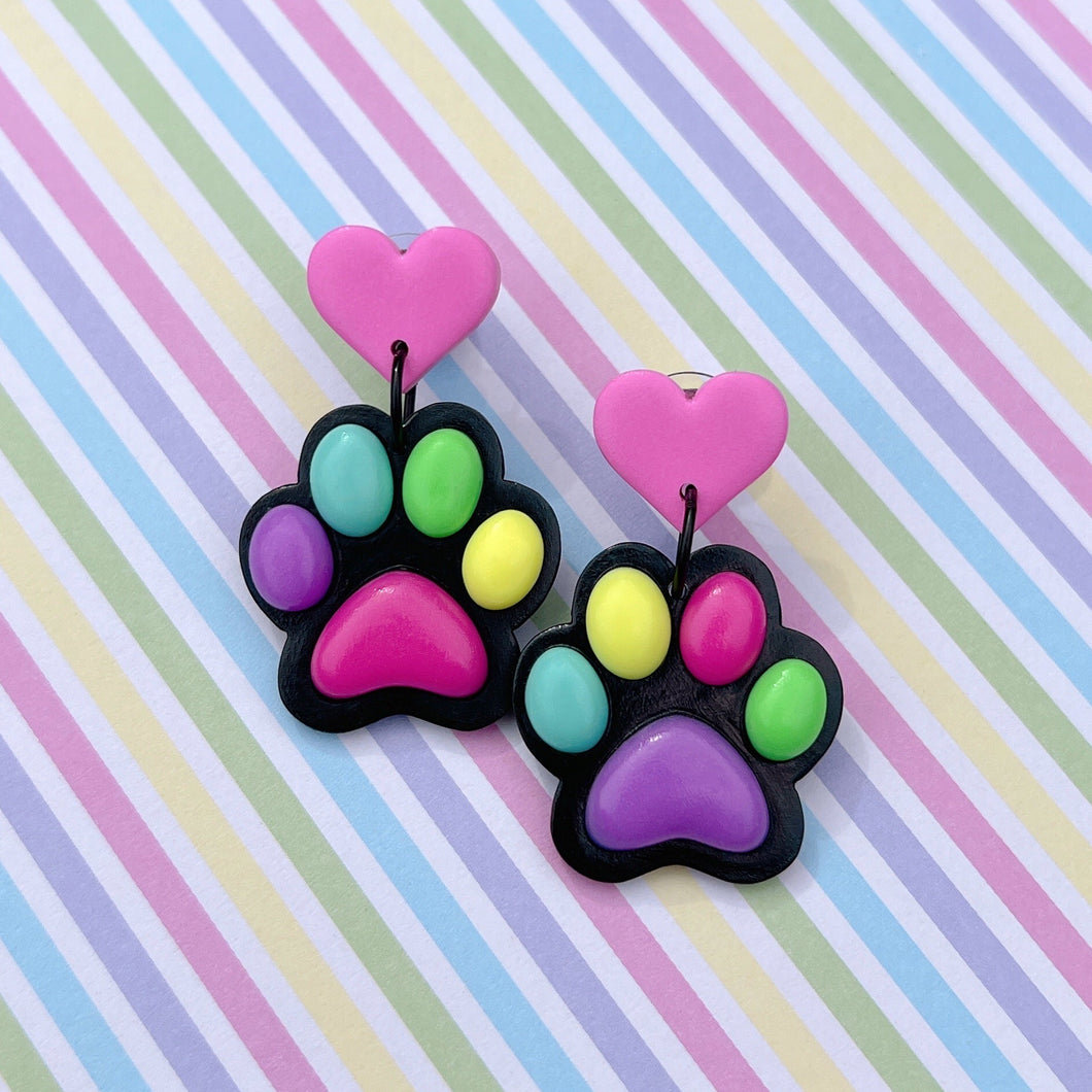 Black and rainbow paw print polymer clay stud earrings