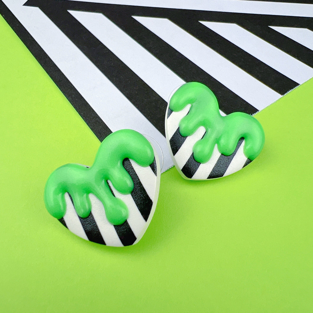 Black, white and green slime heart stud earrings