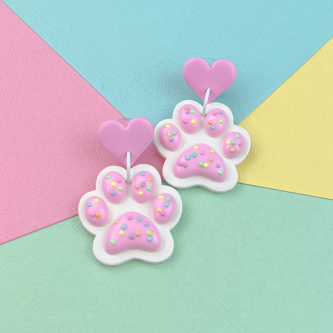Pink sprinkle paw stud earrings