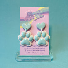 Load image into Gallery viewer, Aqua or purple paw print polymer clay stud earrings
