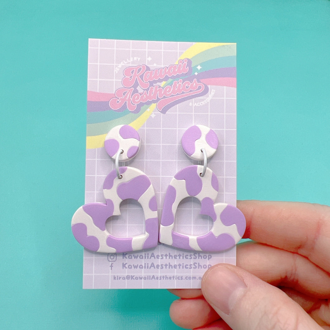 Purple and white cow print polymer clay heart stud earrings