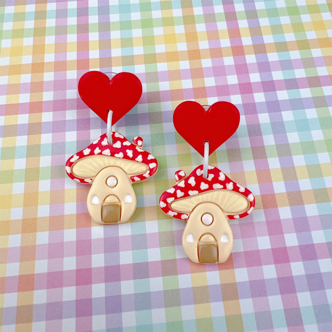 Red mushroom house stud earrings