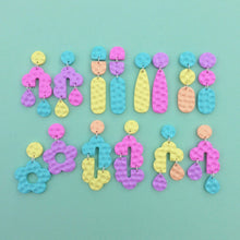 Load image into Gallery viewer, Rainbow textured circle and oval stud earrings
