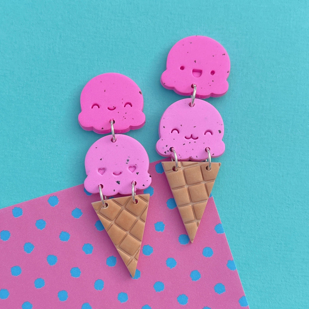 Pink icecream scoop stud earrings with kawaii faces
