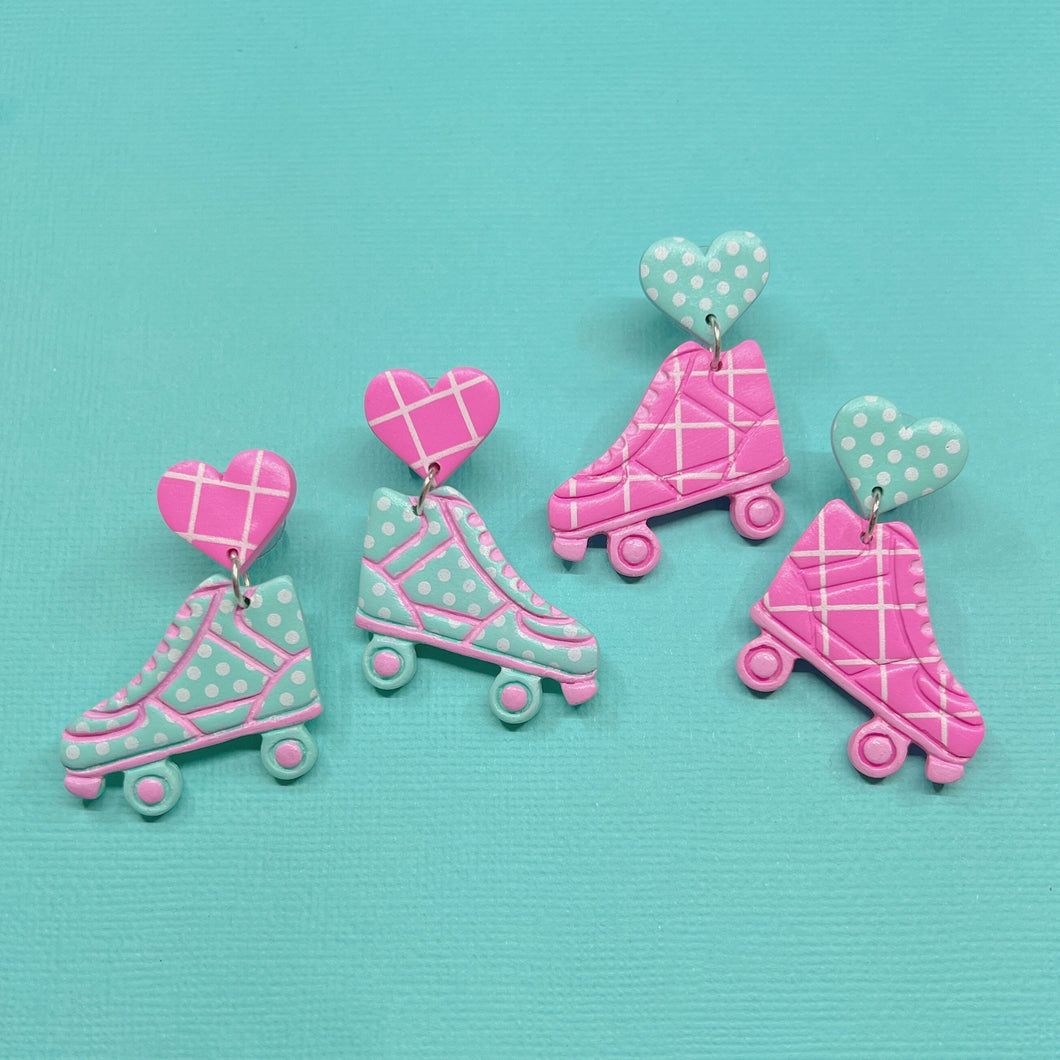 Aqua and pink patterned roller skate stud earrings