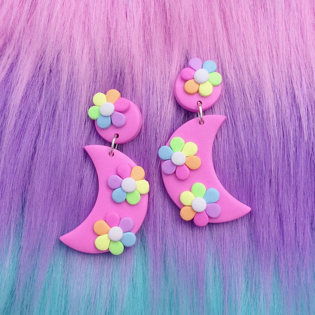 Pink kawaii moon stud earrings with rainbow flowers