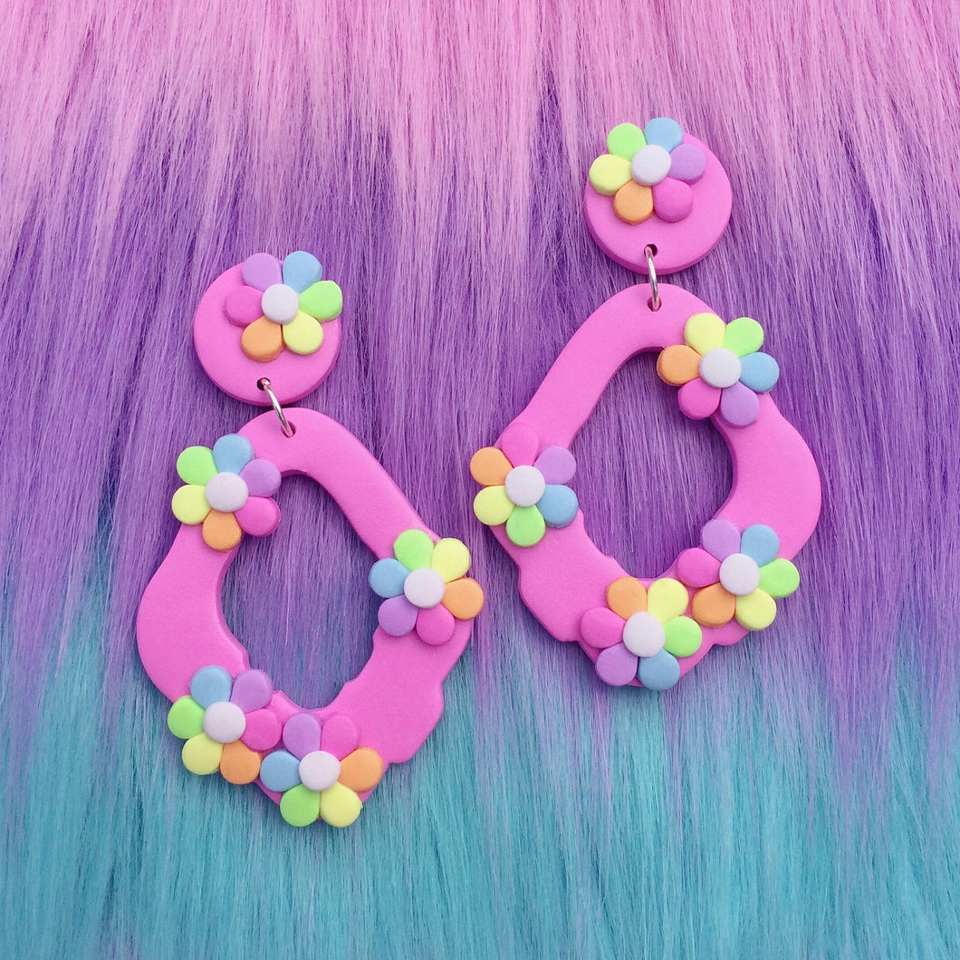 Pink kawaii organic stud earrings with rainbow flowers